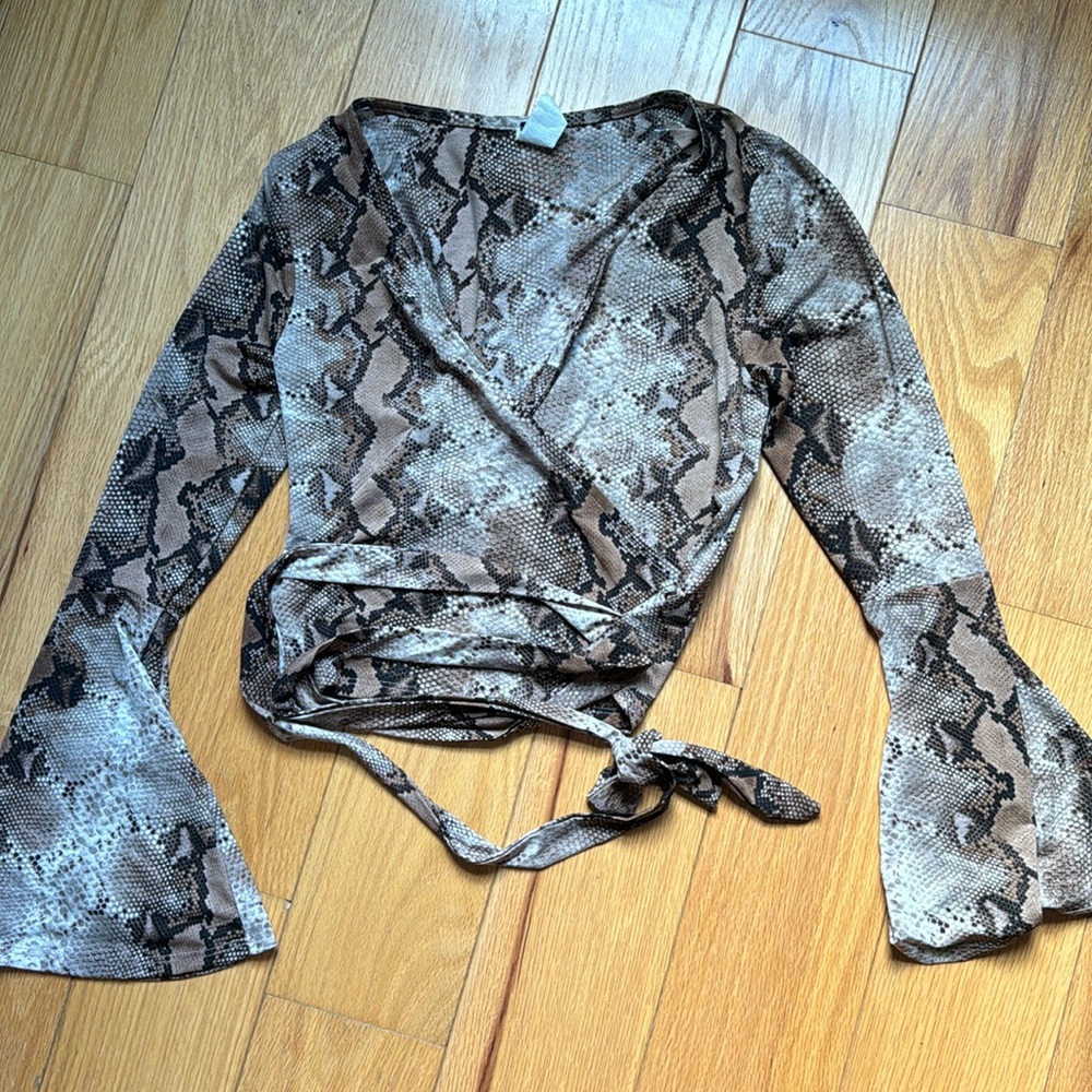 Windsor’s snakeskin bell sleeve wrap around top